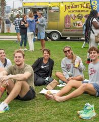 Attendees at The Coastal Alabama Food Truck Festival in Gulf Shores