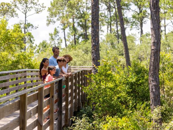 A family enjoying quality time at Gulf State Park in Gulf Shores, Alabama
